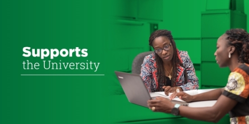 Liverpool-Tasie meets with a Ph.D. student working with her on food systems transformation in Nigeria